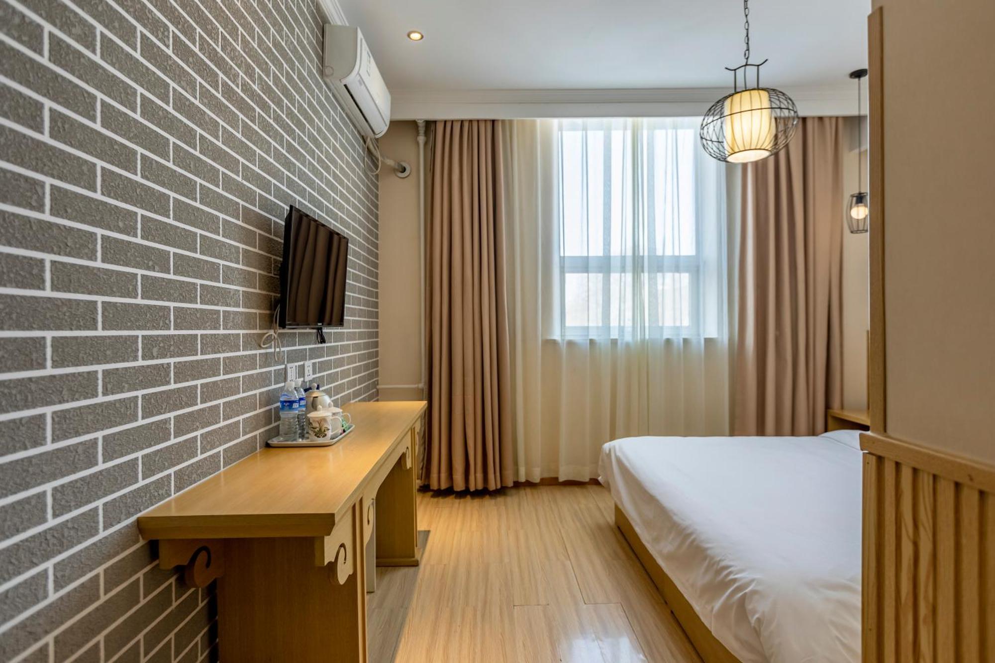 Happy Dragon Alley Hotel-In The City Center With Big Window&Free Coffe, Fluent English Speaking,Tourist Attractions Ticket Service&Food Recommendation,Near Tian Anmen Forbiddencity,Near Lama Temple,Easy To Walk To Nanluoalley&Shichahai בייג'ינג מראה חיצוני תמונה